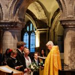 Bride and groom wedding ceremony St Bartholomew the Great church London"
