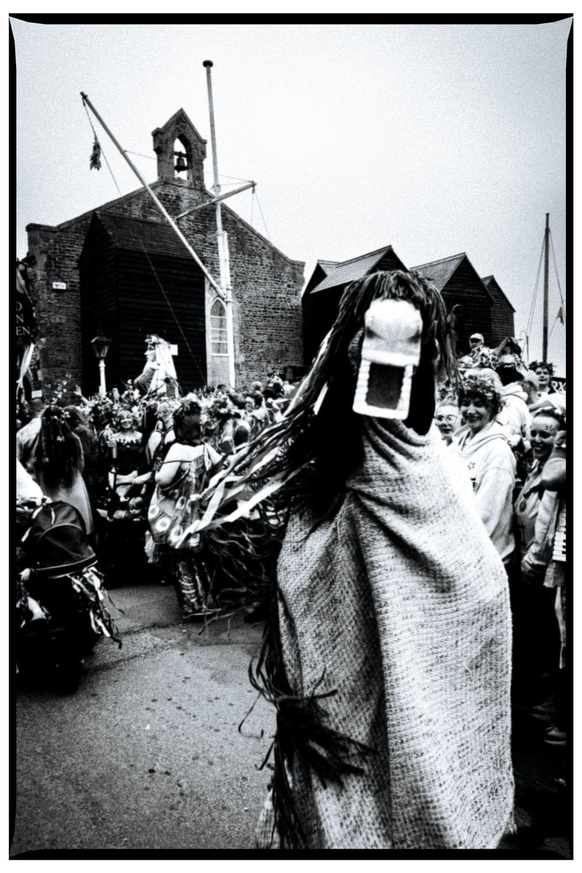 Figure in traditional costume at Hastings Jack in the Green festival