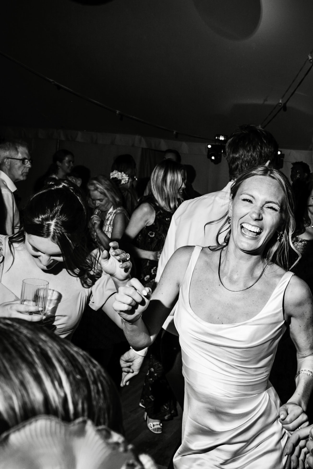 Bride dancing in black and white