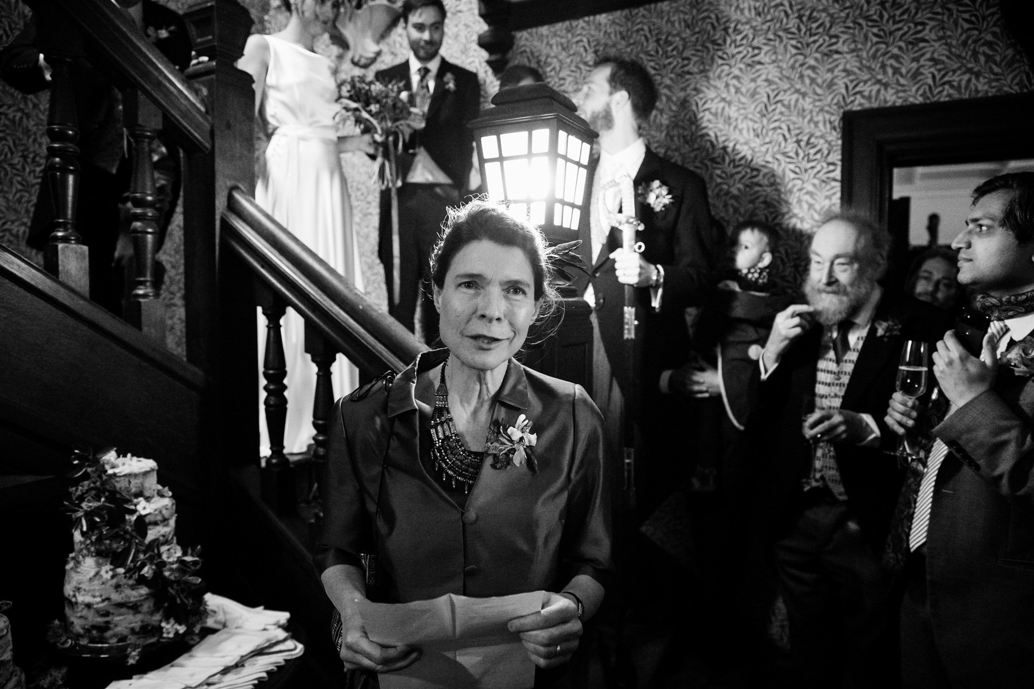 Guests cross a staircase at a wedding