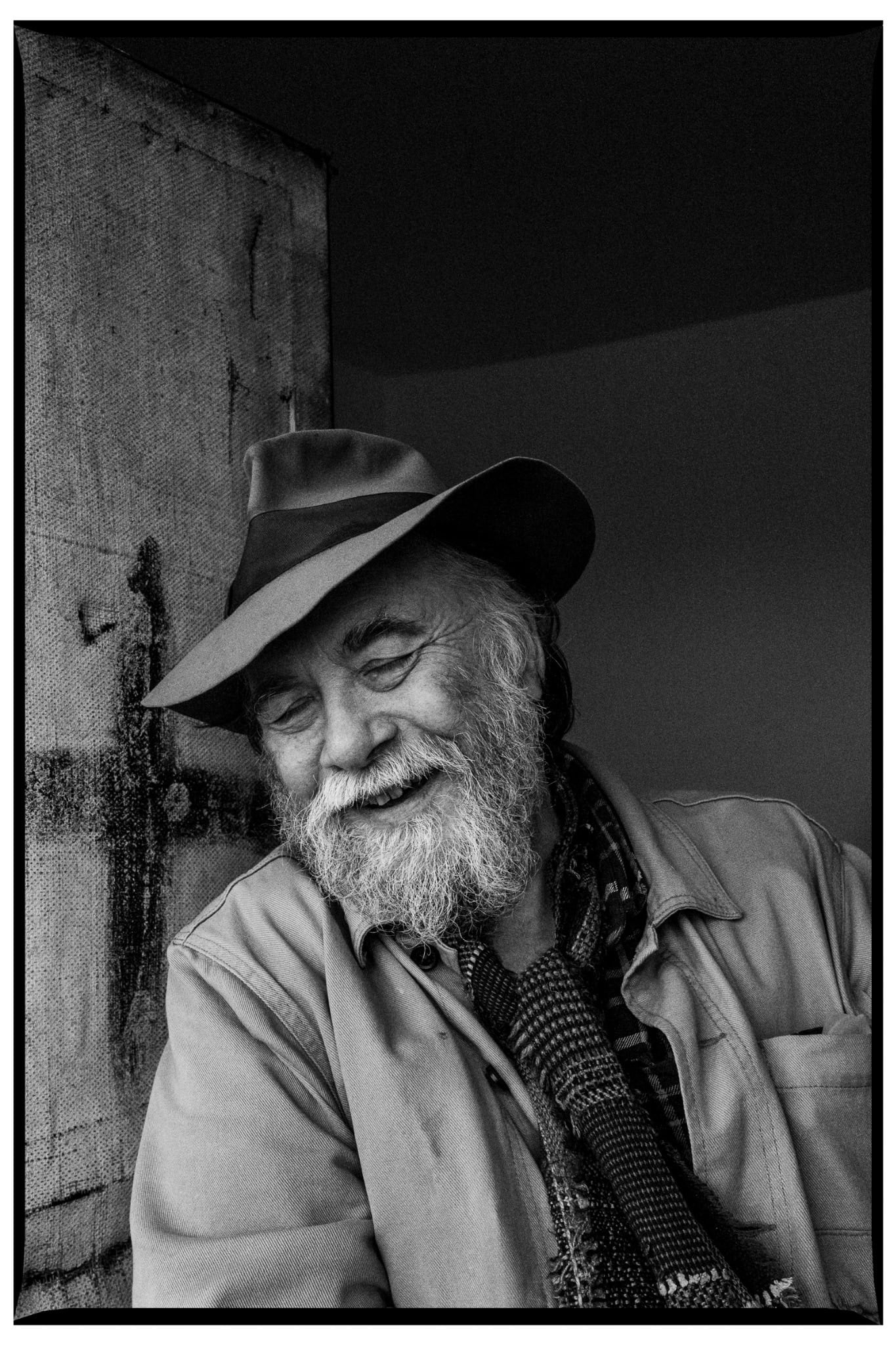 Foxtrot Echo of COUM Transmission smiling at home, wearing a wide-brimmed hat.