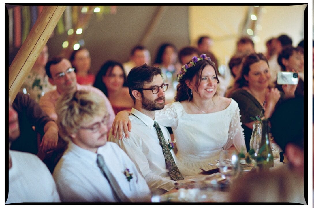 Zoe with her arm around Oliver during the speeches