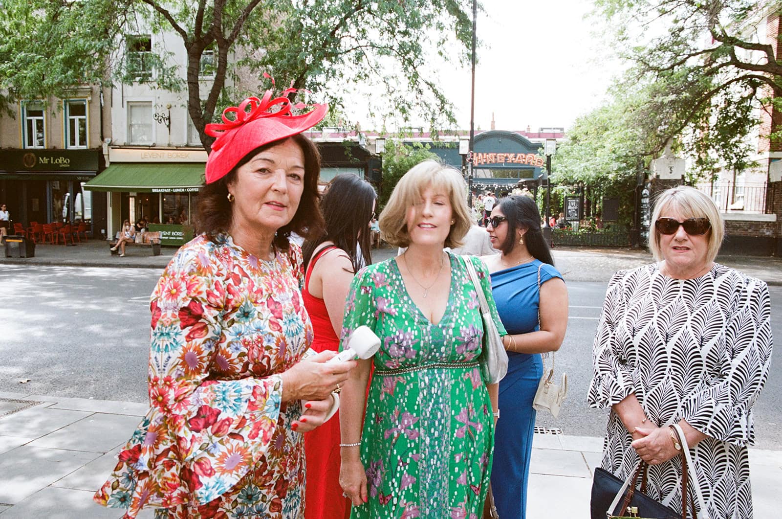 Wedding guests arriving at Islington Town Hall, photographed on film