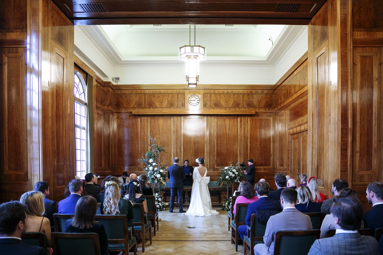 Jo and Will getting married in the Council Chamber at Hackney Town Hall